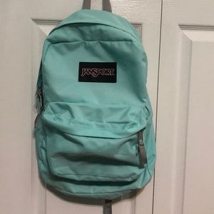 Mint green jansport backpack